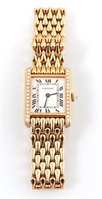 CARTIER "Tank" - Christmas auction