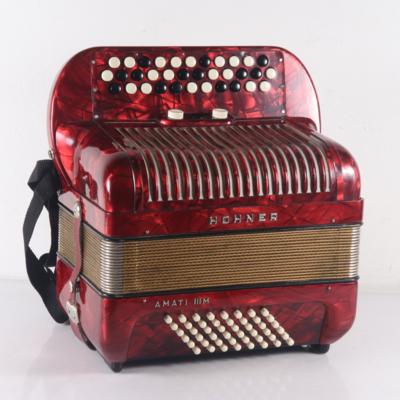 Knopfharmonika - Strumenti musicali