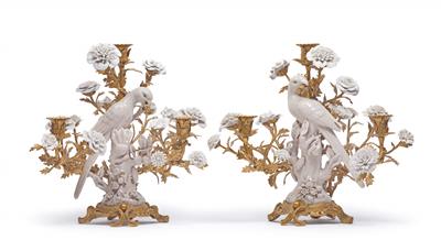 A pair of candlesticks with ‘bronze doré’ mounts and birds sitting on branches, - Works of Art (Furniture, Sculptures, Glass, Porcelain)