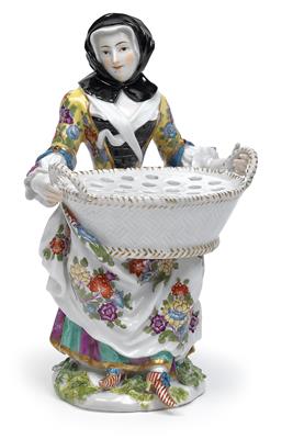 A seated lady with basket of flowers, - Works of Art (Furniture, Sculptures, Glass, Porcelain)