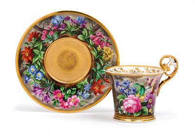 A cup and saucer depicting a wooded landscape and flowers, - Oggetti d'arte