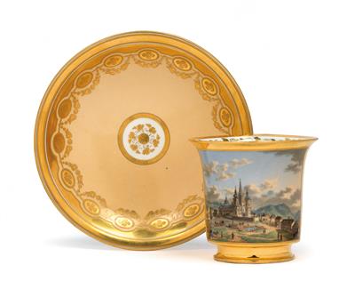 A cup and saucer with veduta of ‘Vue de Marie-Zell dans la Stirie’, - Starožitnosti (Nábytek, Sochařská díla)