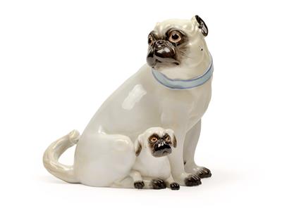 A female pug dog with her young wearing light blue collar with gilt laces, - Works of Art (Furniture, Sculptures, Glass, Porcelain)