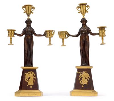 A pair of figural candelabras each with three sockets, - Oggetti d'arte (mobili, sculture, vetri, porcellane)