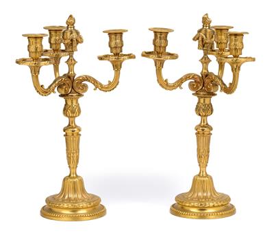 A pair of four-flame candelabras, - Works of Art