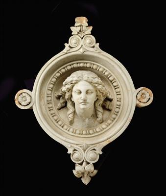 A decorative portrait of a woman, ornamental element from the façade of a house, - Works of Art