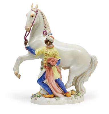 A figure of a Moor with a white horse, - Works of Art