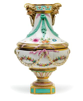 A vase decorated with satyr heads, - Starožitnosti