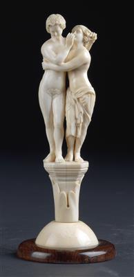 An ivory group, - Works of Art