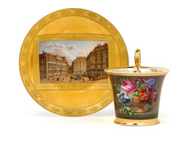 A cup with floral acrostic MARIE and a saucer with the veduta “Vue de la place dite: Lobkowitzplatz á Vienne”, in the original period case, with protective base cover; - Works of Art