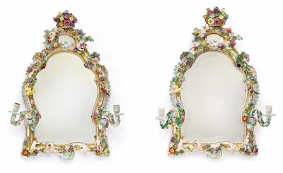 A pair of porcelain mirror frames with faceted mirror glasses, - Nábytek
