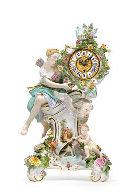 A porcelain clock case with movement, - Furniture and works of art