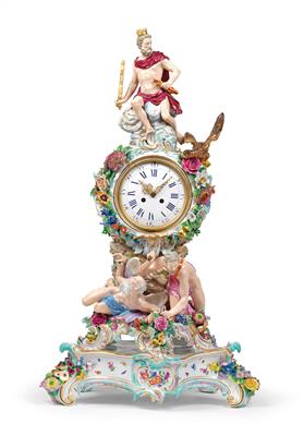 A porcelain clock case with movement and plinth, - Furniture and works of art