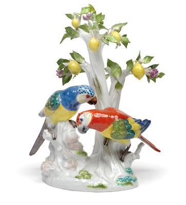 A pair of parrots perched on a lemon tree with fruits and blossoms and on a tree stump with leaves, - Works of Art - Furniture, Sculptures, Glass and Porcelain