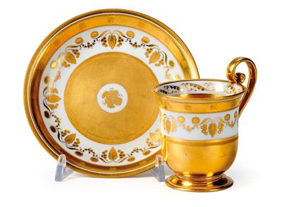 A Cup and Saucer with Gold Décor, - Starožitnosti