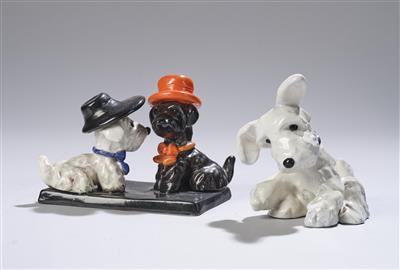 Ida Meisinger (1897-1985), Figurengruppe: zwei sich beschnuppernde Terrier mit Hut auf Rechtecksockel,Ausführung: Wiener Manufaktur Friedrich Goldscheider, bis ca. 1941 - Jugendstil e arte applicata del XX secolo