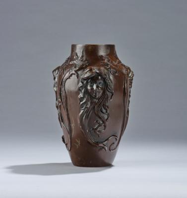 Carl Cauba (1865-1922), a bronze vase with female heads in relief and vegetal decoration, designed in around 1900 - Jugendstil and 20th Century Arts and Crafts