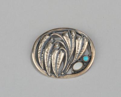 A silver brooch with bog-star decoration, set with turquoise and mother-of-pearl, designed in around 1900/15 - Jugendstil and 20th Century Arts and Crafts