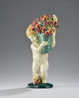 An autumn season putto with a large vase with fruit and grapes and small birds, model number 1565, executed by Wiener Kunstkeramische Werkstätte (WKKW), c. 1912/15 - Jugendstil e arte applicata del XX secolo