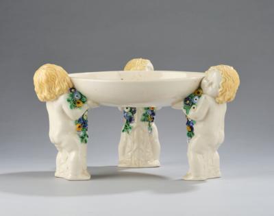 Michael Powolny, “a centrepiece with three standing putti, no. 154”, model number K 0345, designed in around 1907, executed by Vereinigte Wiener und Gmundner Keramik, by c. 1919 - Secese a umění 20. století