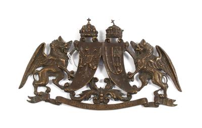 A cast yellow metal emblem, - Antique Arms, Uniforms and Militaria