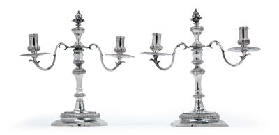 A pair of two-light candlesticks from Rome, - Argenti