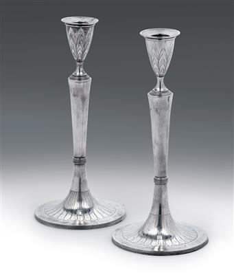 A pair of neoclassical candlesticks from Vienna, - Argenti