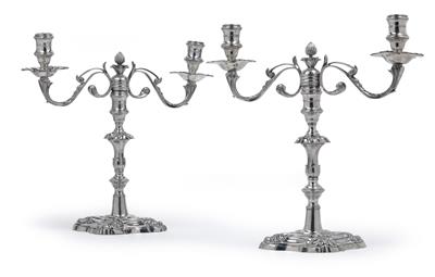 A pair of two-light candlesticks from Riga, - Argenti