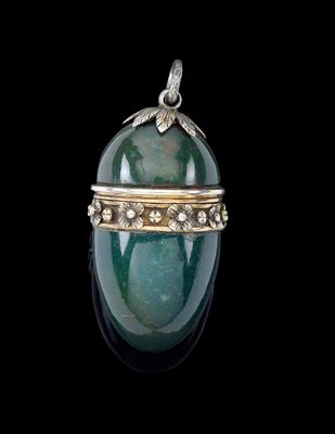 A pendant of ovoid form, - Silver
