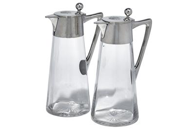 A pair of wine jugs from Germany, - Silver
