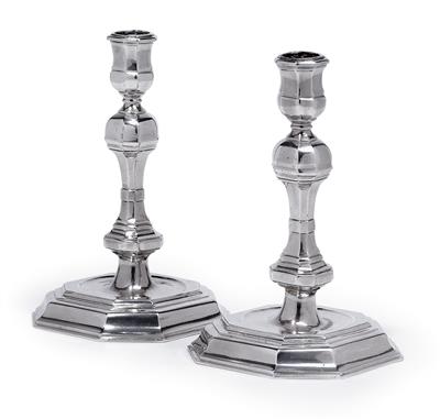 A pair of candleholders, - Stříbro