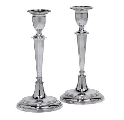 A pair of neoclassical candleholders, - Stříbro