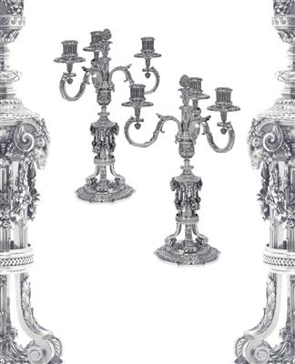 A pair of three-light candleholders from Paris, - Silver