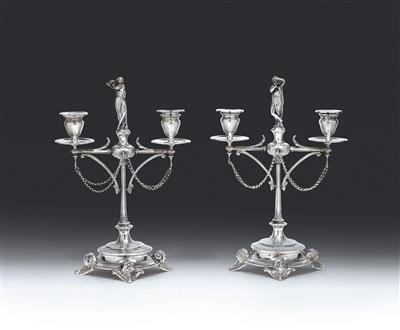 A pair of two-light candleholders from Paris, - Stříbro