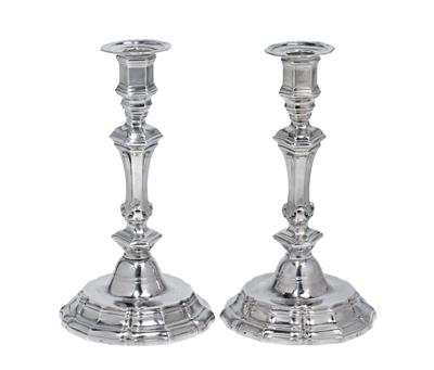 A pair of candlesticks, - Silver