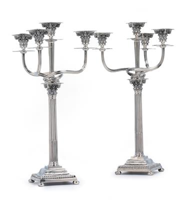 A pair of four-light candleholders from Portugal, - Silver