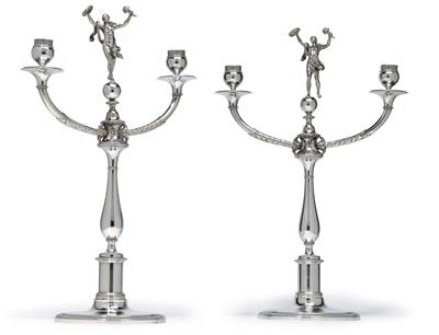 A pair of two-light candleholders from Milan, - Silver