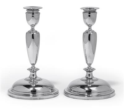 A pair of candleholders from Vienna, - Argenti