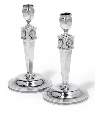A pair of candleholders from Paris, - Argenti