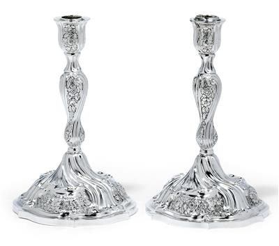 A pair of candleholders from Paris, - Stříbro