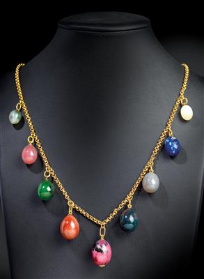 A chain with 9 egg pendants, - Stříbro