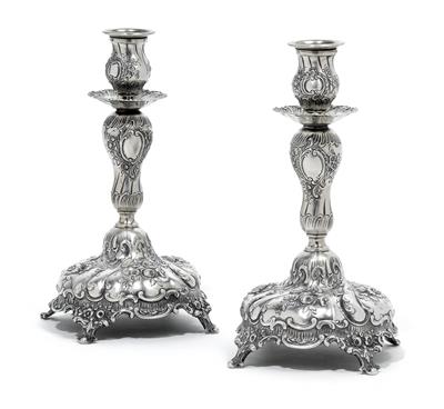 A pair of candleholders from Germany, - Silver