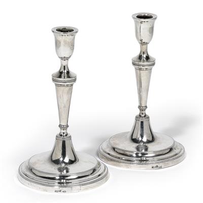 A pair of candleholders from Spain, - Stříbro