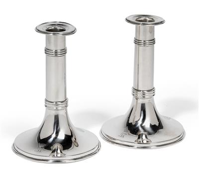 A pair of candleholders from Vienna, - Silver