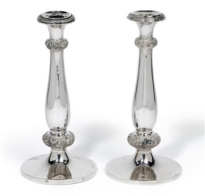 A pair of candleholders from Vienna, - Silver
