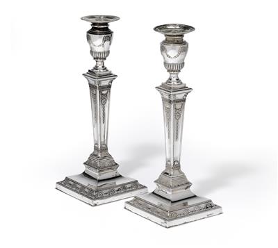 A pair of candleholders from Germany, - Silver and Russian Silver