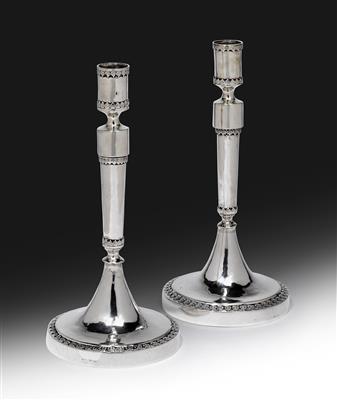 A pair of candleholders from North Italy, - Silver and Russian Silver