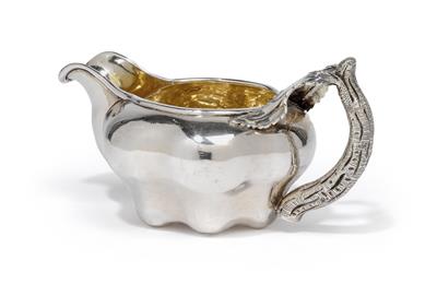 A milk jug from St Petersburg, - Silver and Russian Silver