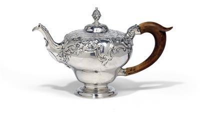 A George II teapot from London, - Silver and Russian Silver