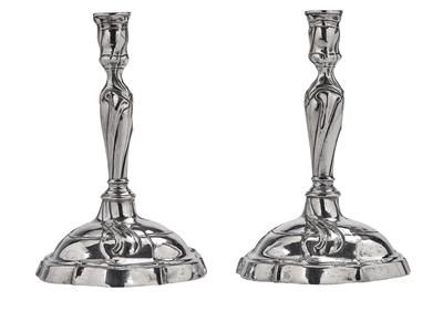 A Pair of Historicist Candleholders from Germany, - Silver and Russian Silver